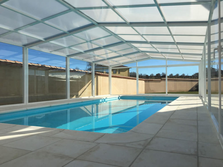 Cubierta Vulcano: Cerramiento de policarbonato alto y fijo para piscina en Ávila